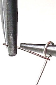 bending wire to form wrapped loop bending wire to form wrapped loop