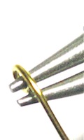 Form small loop in wire Form small loop in wire