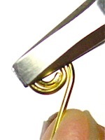 Push wire with thumb Push wire with thumb
