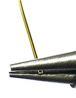 Hold wire with round nose pliers Hold wire with round nose pliers
